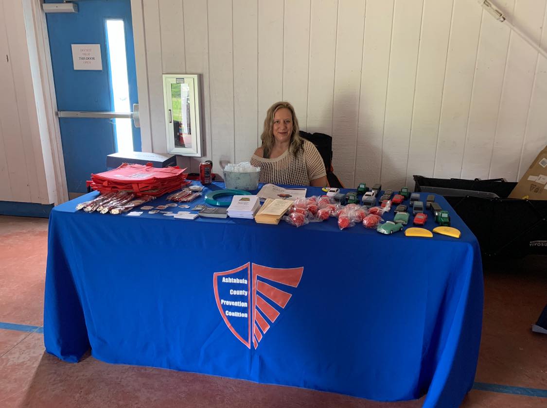 Table with Christy Fisher at the Responsible Fatherhood event